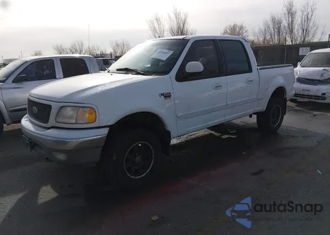 2001 Ford F-150 King Ranch Edition/Lariat/Xlt z USA, uszkodzony, nr VIN 1FTRW08W21KE29547